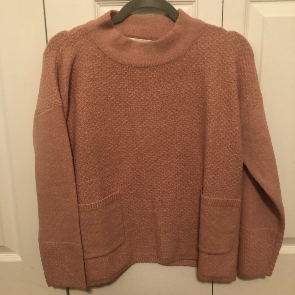 Pink sweater with pockets